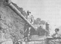 Thai soldiers on a tank supported